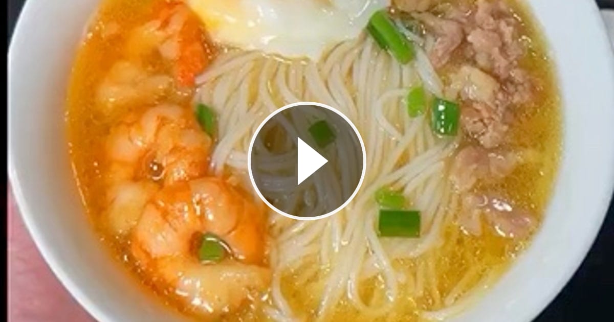 Vietnamese-style shrimp and pork noodle soup (hủ tiếu), topped with a fried egg, fresh scallions, and chopped… – @yummy.7